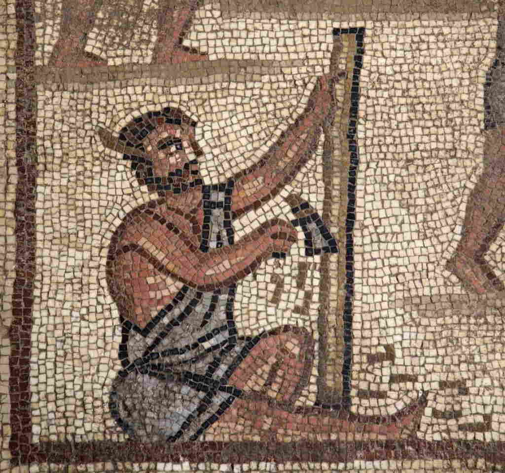 Este mosaico de la sinagoga Huqoq en la Baja Galilea representa a hombres trabajando, construyendo una torre de piedra, al parecer la Torre de Babel. (Jim Haberman UNC Media Relations)