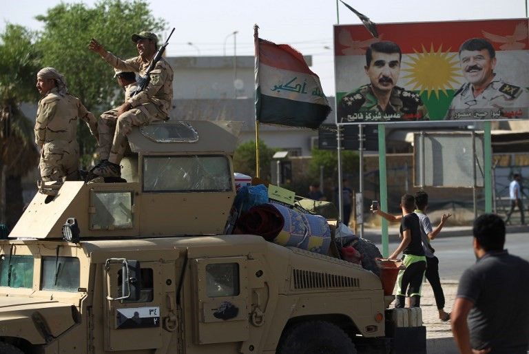 Las fuerzas iraquíes avanzan hacia el centro de Kirkuk durante una operación contra los combatientes kurdos el 16 de octubre de 2017. (AFP PHOTO / AHMAD AL-RUBAYE)