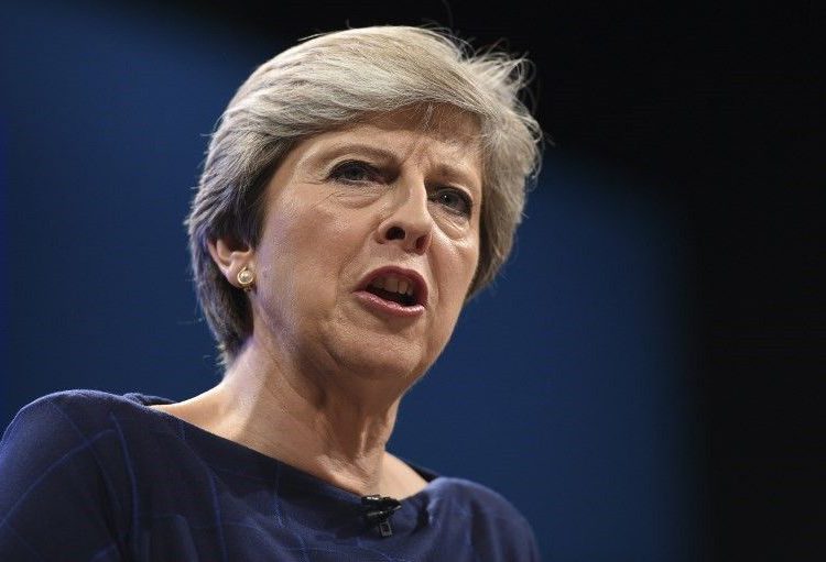 La Primera Ministra británica Theresa May pronunció su discurso en el último día de la conferencia anual del Partido Conservador en el Centro de Convenciones de Manchester en Manchester, noroeste de Inglaterra, el 4 de octubre de 2017 (AFP / Oli Scarff)