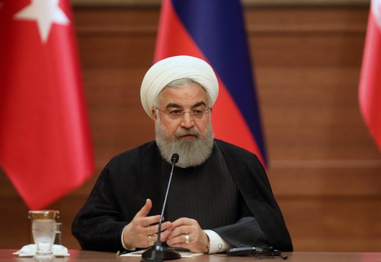 El presidente iraní Hassan Rouhani habla durante una conferencia de prensa conjunta con los líderes de Turquía y Rusia como parte de una cumbre tripartita sobre Siria, en Ankara, el 4 de abril de 2018. (AFP PHOTO / ADEM ALTAN)
