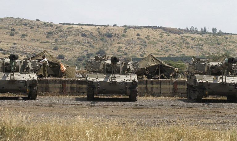 Una unidad de artillería israelí toma posición cerca de la frontera con Siria en los Altos del Golán el 9 de mayo de 2018. (Jalaa Marey / AFP)