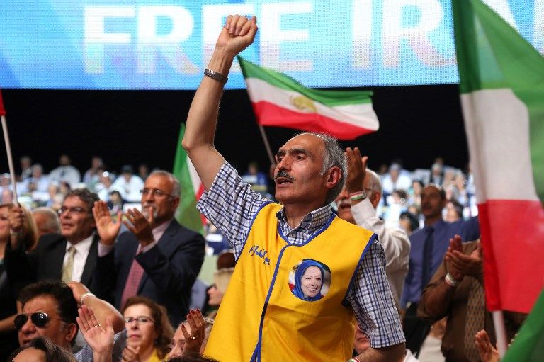 La gente asiste al evento “Irán libre 2018 - la alternativa” el 30 de junio de 2018 en Villepinte, al norte de París durante la reunión anual del Consejo Nacional de la Resistencia Iraní (NCRI). (AFP / Zakaria ABDELKAFI)