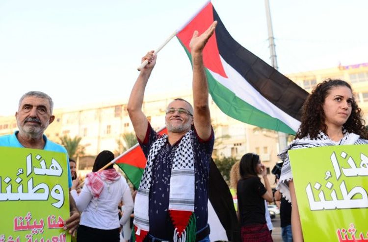 La ironía de usar la bandera palestina para protestar contra la ley del Estado-Nación