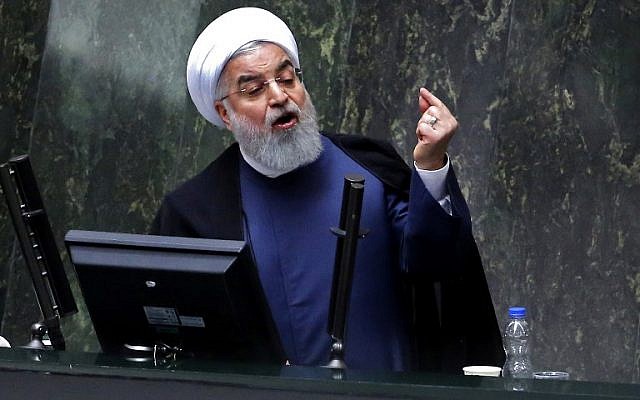 Iran’s President Hassan Rouhani speaks at the Iranian Parliament in the capital Tehran on August 28, 2018. (AFP Photo/Atta Kenare)