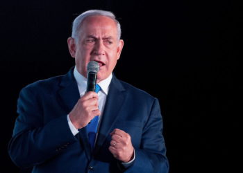 El primer ministro Benjamin Netanyahu habla en una conferencia organizada por el diario financiero Globes en Jerusalén el 19 de diciembre de 2018. (Yonatan Sindel / Flash90