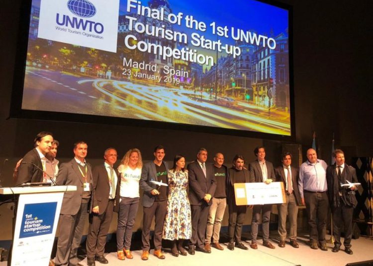 Los ganadores y los representantes de WTO, Globalia y Refundit en el escenario de Madrid, 23 de enero de 2019. Cortesía