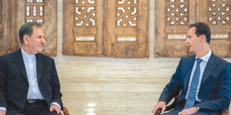 El presidente de la República de Irán, Eshaq Jahangiri, se reúne esta semana con el presidente de Siria, Bashar Assad, en Damasco. . (Crédito de la foto: SANA / REUTERS)