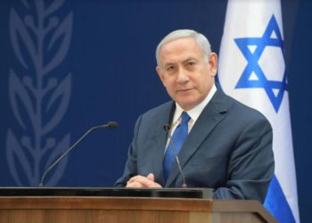 El primer ministro Benjamin Netanyahu en el servicio conmemorativo a Levi Eshkol. (Crédito de la foto: AMOS BEN-GERSHOM / GPO)
