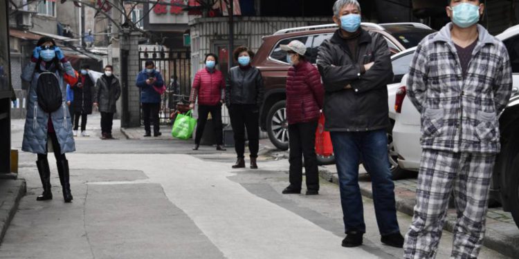 Ciudad china de Hubei alivia restricciones impuestas por el coronavirus
