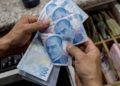 La lira turca alcanza un mínimo histórico frente al dólar