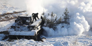 Russian units near Ukraine moved into "attack positions," U.S. official says