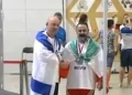 Irán suspende de por vida a atleta por saludar a competidor israelí