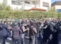 Jordanian security forces disperse the crowd of thousands of protesters trying to storm the Israeli embassy in Amman, Jordan in protest of the war in Gaza on October 18, 2023. (Screen capture/X)