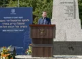 President Isaac Herzog speaks at the state memorial ceremony for the defenders who fell in the 1920 Battle of Tel Hai, March 11, 2025 (Maayan Toaf/GPO)