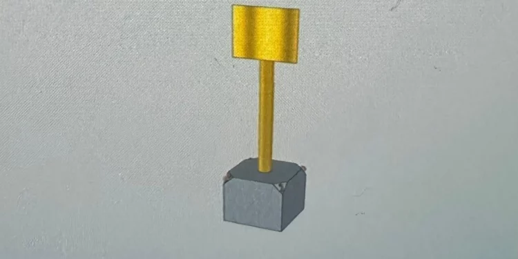 Esta imagen, publicada por la oficina del ministro de Defensa, Israel Katz, el 17 de octubre de 2025, muestra una maqueta de un marcador físico que se colocará en la Franja de Gaza para demarcar la Línea Amarilla. (Cortesía)