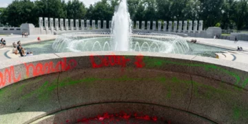 Damage seen after vandals poured bubble soap and painted graffiti on the World War II Memorial in Washington, DC on August 13, 2026. (Andrew Leyden/ZUMA Press Wire)