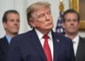 US President Donald Trump listens as Gemini co-founder and president Cameron Winklevoss, left, and Gemini co-founder and CEO Tyler Winklevoss, right, watch, during a meeting with technology leaders in the Roosevelt Room of the White House, August 19, 2026, in Washington. (AP Photo/Jacquelyn Martin)