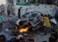 Palestinians try to extinguish a burning car after an Israeli military strike in Gaza City, August 2, 2026. (AP/Jehad Alshrafi)