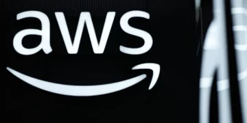 The logo of Amazon Web Services (AWS) is seen during the opening of the Hannover Messe industrial trade fair for mechanical and electrical engineering and digital industries, on March 31, 2025 in Hanover, northern Germany. (Photo by RONNY HARTMANN / AFP)