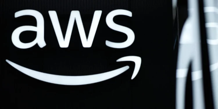 The logo of Amazon Web Services (AWS) is seen during the opening of the Hannover Messe industrial trade fair for mechanical and electrical engineering and digital industries, on March 31, 2025 in Hanover, northern Germany. (Photo by RONNY HARTMANN / AFP)
