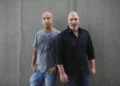 'Fauda' co-creators Avi Issacharoff (left) and Lior Raz in Tel Aviv, May 30, 2019. (AP Photo/Oded Balilty)
