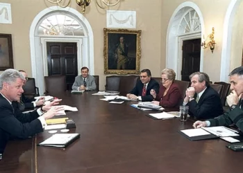 US President Bill Clinton meets with his National Security team on April 7, 1999, in the White House Cabinet Room. From left: Clinton, Steve Ricchetti, Gen. Donald Kerrick, CIA Director George Tenet, Secretary of State Madeleine Albright, Samuel Berger, and Gen. Hugh Shelton.