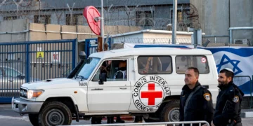 A vehicle of the International Committee of the Red Cross (ICRC) arrives outside Ofer military prison, located between Ramallah and Beitunia in the West Bank, on January 19, 2025. (Photo by Jalaa MAREY / AFP)