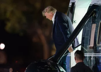 President Donald Trump steps off from Marine One upon his arrival at the Ellipse just outside of the White House, September 13, 2026, in Washington. (AP Photo/Jose Luis Magana)