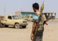 Forces loyal to Yemen’s Saudi-backed government stand near a pickup truck in the Hays district, south of Hodeidah, September 5, 2026. (Khaled ZIAD/AFP)