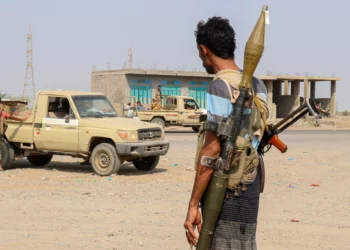 Forces loyal to Yemen’s Saudi-backed government stand near a pickup truck in the Hays district, south of Hodeidah, September 5, 2026. (Khaled ZIAD/AFP)