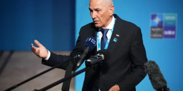 Slovenia’s Prime Minister Janez Jansa speaks as he arrives for the NATO summit in Ankara, Turkey, July 8, 2026. (AP Photo/Emrah Gurel)