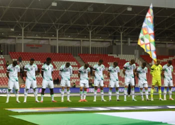 Ireland's soccer players bow their heads as the Israeli national anthem plays before their UEFA Nations League match in Debrecen, Hungary, September 27, 2026. (Bernadett Szabo/Reuters)