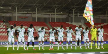 Ireland's soccer players bow their heads as the Israeli national anthem plays before their UEFA Nations League match in Debrecen, Hungary, September 27, 2026. (Bernadett Szabo/Reuters)