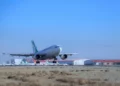 Illustrative: an Iranian Mahan Air plane lands at the Tehran's Imam Khomeini International Airport, February 4, 2021. (Saeed Kaari/IKAC via AP)