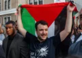 Anti-Israel, pro-Palestinian US activist Mahmoud Khalil carries a Palestinian flag during a rally celebrating his return from immigration detention, June 22, 2025, in New York. (AP Photo/Olga Fedorova)