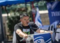MK Michael Biton speaks during a press conference outside the Knesset in Jerusalem, March 31, 2025. (Chaim Goldberg/Flash90)