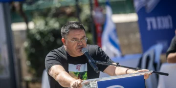 MK Michael Biton speaks during a press conference outside the Knesset in Jerusalem, March 31, 2025. (Chaim Goldberg/Flash90)