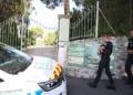 Police officers patrol in front of the entrance of the Musee Renoir after four paintings, valued at $10 million, were stolen from the museum in an early-morning break-in, with the two suspects still at large, in Cagnes-sur-Mer on September 8, 2026. (Valery HACHE/AFP)