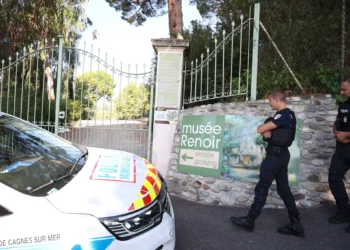 Police officers patrol in front of the entrance of the Musee Renoir after four paintings, valued at $10 million, were stolen from the museum in an early-morning break-in, with the two suspects still at large, in Cagnes-sur-Mer on September 8, 2026. (Valery HACHE/AFP)