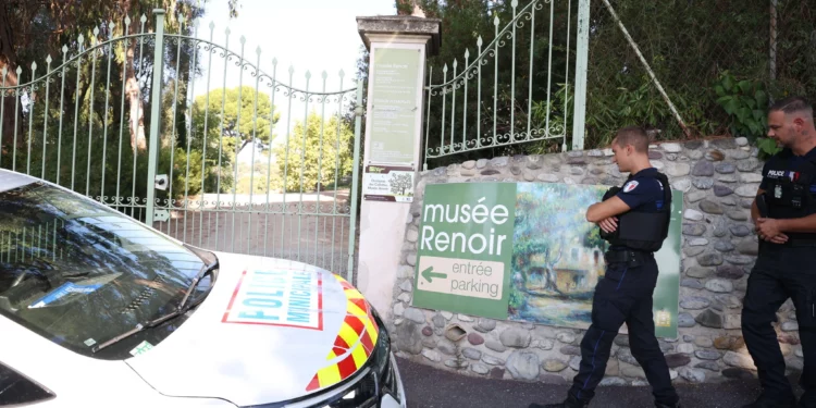 Police officers patrol in front of the entrance of the Musee Renoir after four paintings, valued at $10 million, were stolen from the museum in an early-morning break-in, with the two suspects still at large, in Cagnes-sur-Mer on September 8, 2026. (Valery HACHE/AFP)