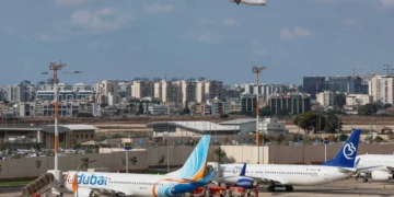 A passenger is seen with a bloodied shirt aboard a flydubai flight from Dubai to Tel Aviv that suffered an emergency mid-air, with the co-pilot subdued after stabbing the captain in an alleged attempt to crash the plane full of Israelis, September 30, 2026 (Social media: used in accordance with Clause 27a of the Copyright Law)