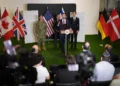 US Vice President JD Vance speaks to the media as US Special Envoy to the Middle East Steve Witkoff and Jared Kushner stand next to him, in Kiryat Gat, Israel, October 21, 2025. (AP/Francisco Seco)