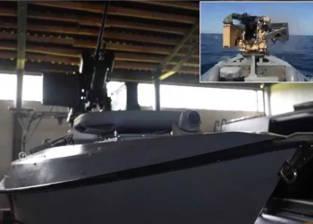 Ukraine’s Sargan 3000 armed unmanned surface vessel, fitted with a 12.7 mm Protector remote weapon station, with inset footage showing the reported September 12, 2026 attack on a Russian unmanned boat in the Black Sea. (Picture source: Ukrainian Navy)