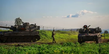 IDF soldiers at a staging area near the Israeli border with Syria, February 28, 2026. (Michael Giladi/Flash90)