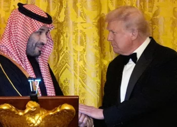 US President Donald Trump shakes hands with Saudi Arabia’s Crown Prince Mohammed bin Salman during a dinner in the East Room of the White House, November 18, 2025, in Washington. (AP/Alex Brandon)