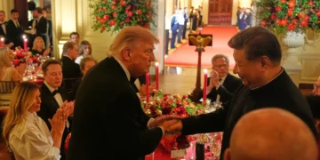 US President Donald Trump shakes hands with China’s President Xi Jinping in the East Room of the White House during a State Dinner, September 24, 2026, in Washington. (AP Photo/Alex Brandon)