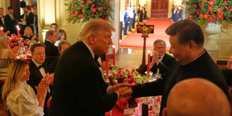 US President Donald Trump shakes hands with China’s President Xi Jinping in the East Room of the White House during a State Dinner, September 24, 2026, in Washington. (AP Photo/Alex Brandon)