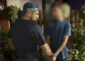 Yaqoub Shibli durante su arresto el 16 de agosto por presuntamente jurar lealtad al Estado Islámico.