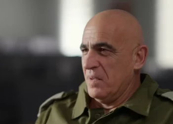 Reservist commander Yossi Bachar speaks to Kan, in November 2023 (Video screenshot)