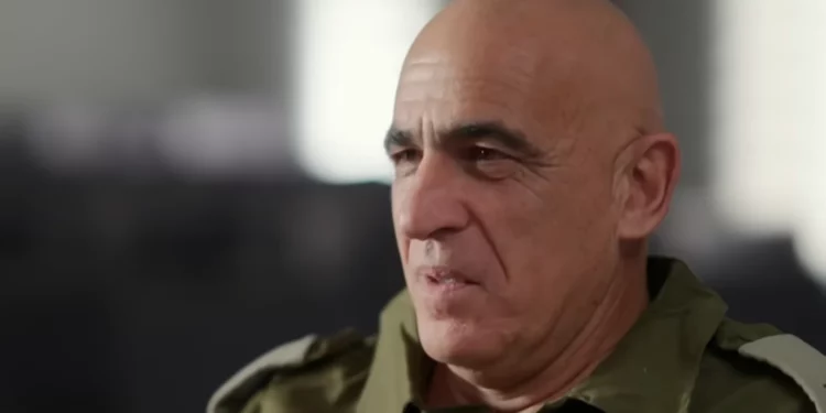 Reservist commander Yossi Bachar speaks to Kan, in November 2023 (Video screenshot)